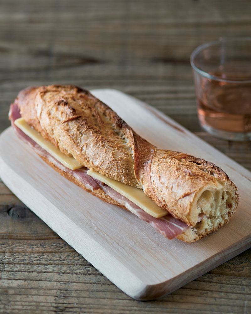 a sandwich on a cutting board