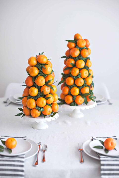 christmas table decorations like citrus topiaries