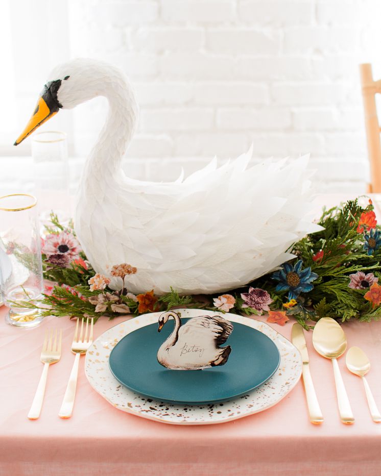 christmas table decorations like a swan centerpiece
