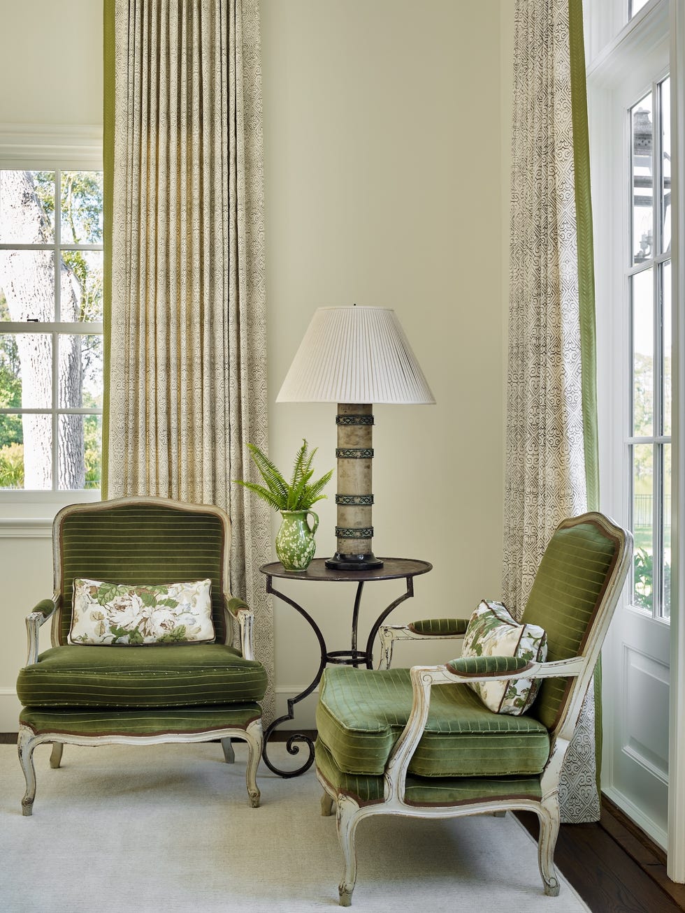 living room with green chairs