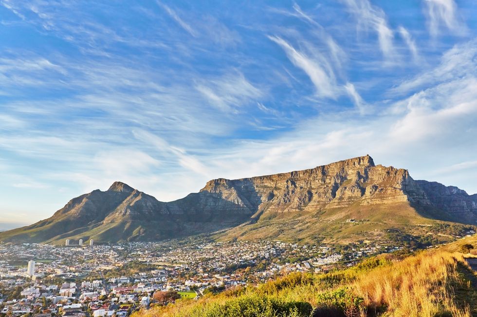 table mountain and cape town city at sunrise