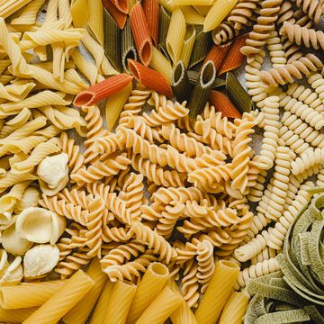 table top view of variety of uncooked pasta