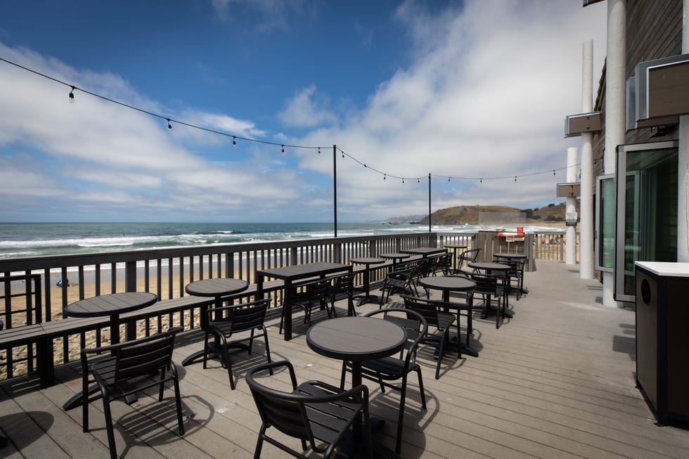 Sky, Sea, Deck, Furniture, Cloud, Building, Table, Boardwalk, Real estate, Deck, 