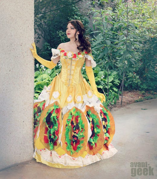 Clothing, Dress, Yellow, Shoulder, Costume design, Fashion, Gown, Pattern, Textile, Costume, 