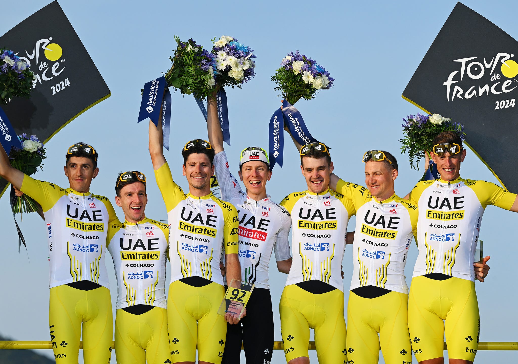 tadej pogacar pavel sivakov marc soler nils politt adam yates joao almeida tim wellens celebrate at podium