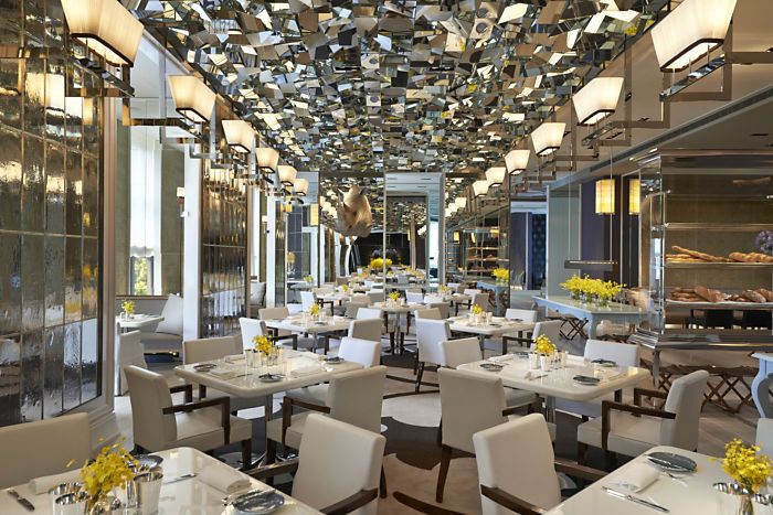Restaurant, Building, Interior design, Yellow, Lighting, Room, Table, Dining room, Ceiling, Architecture, 