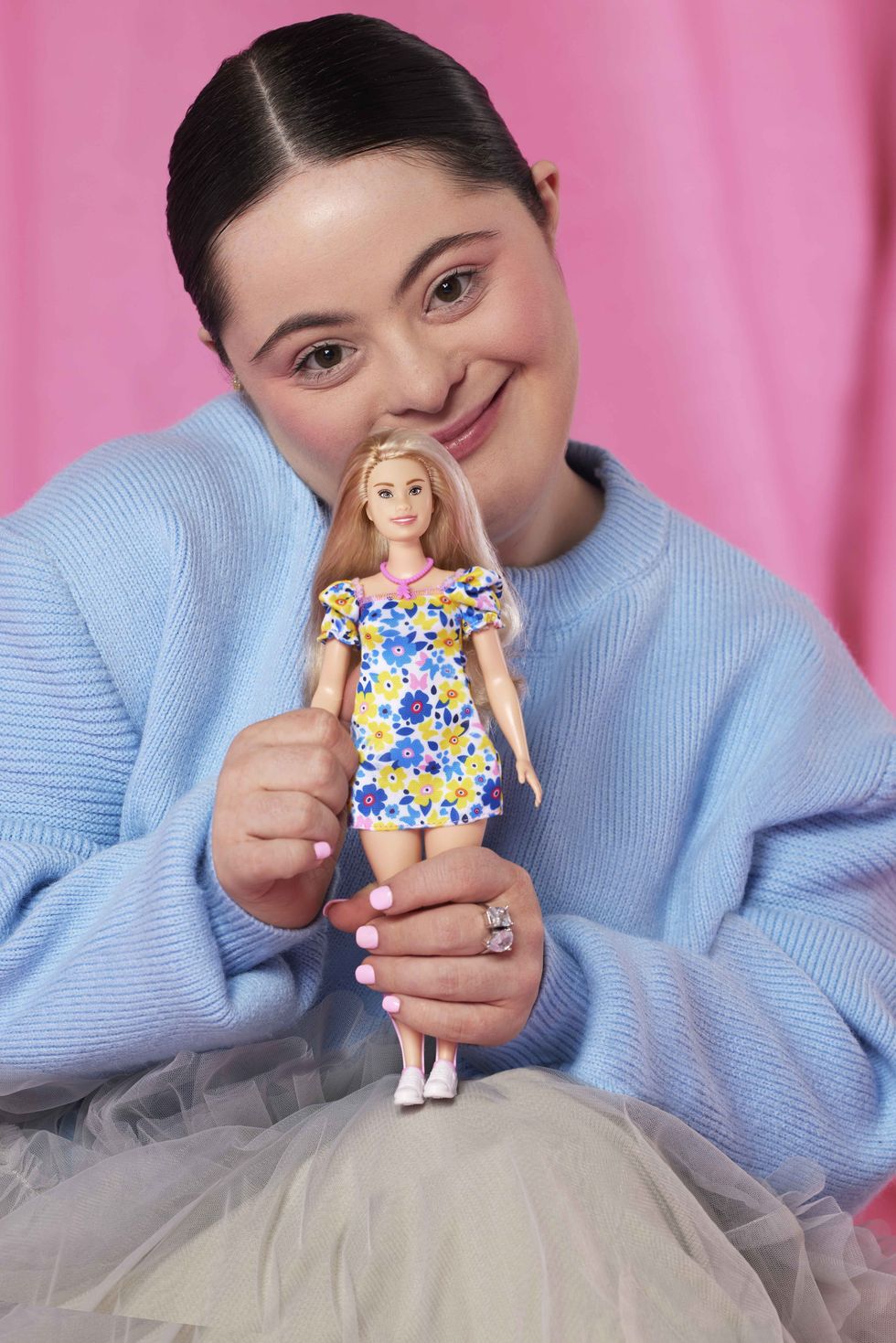 british model ellie goldstein poses with barbie's first doll with down's syndrome, the newest addition to the fashionistas line