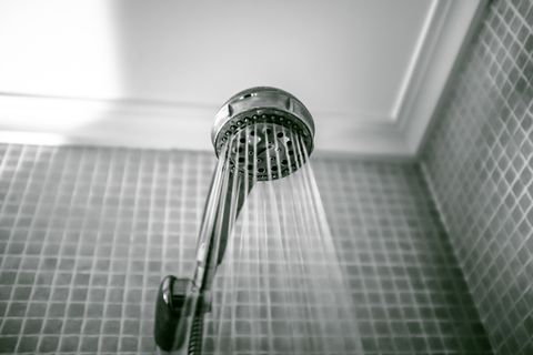 Low Angle View Of Shower Spraying Water