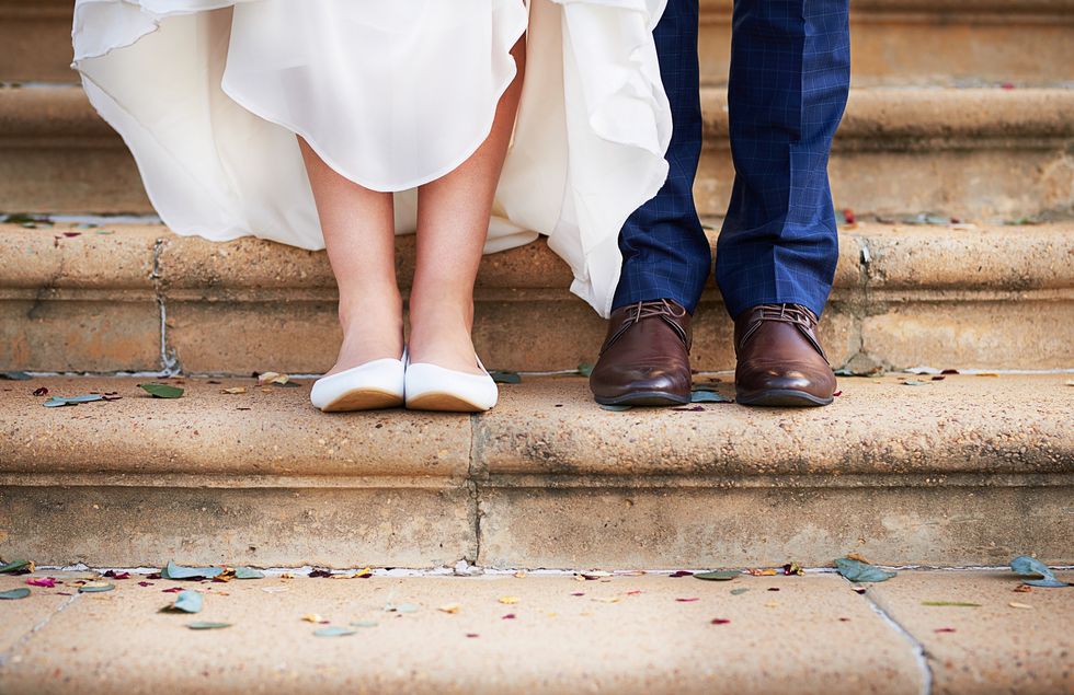 married couple standing on courthouse steps
