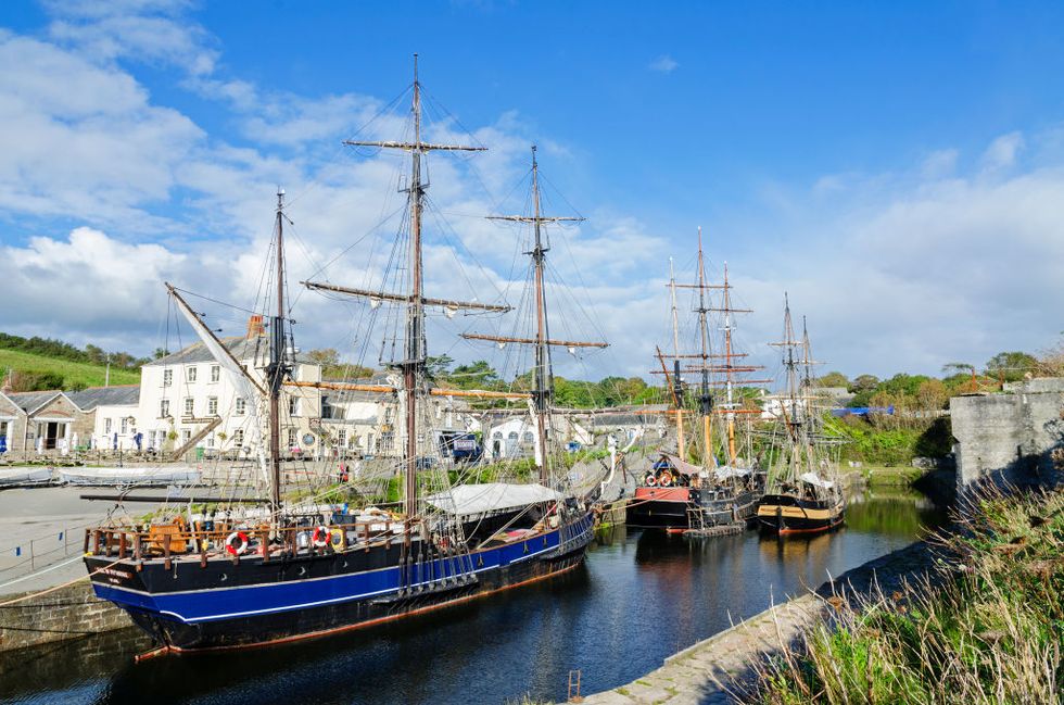 Tall Ships In The Historic Port Of Charlestown, Cornwall,