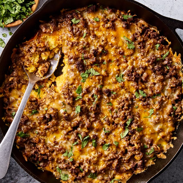 tamale pie with cheese and cilantro on top