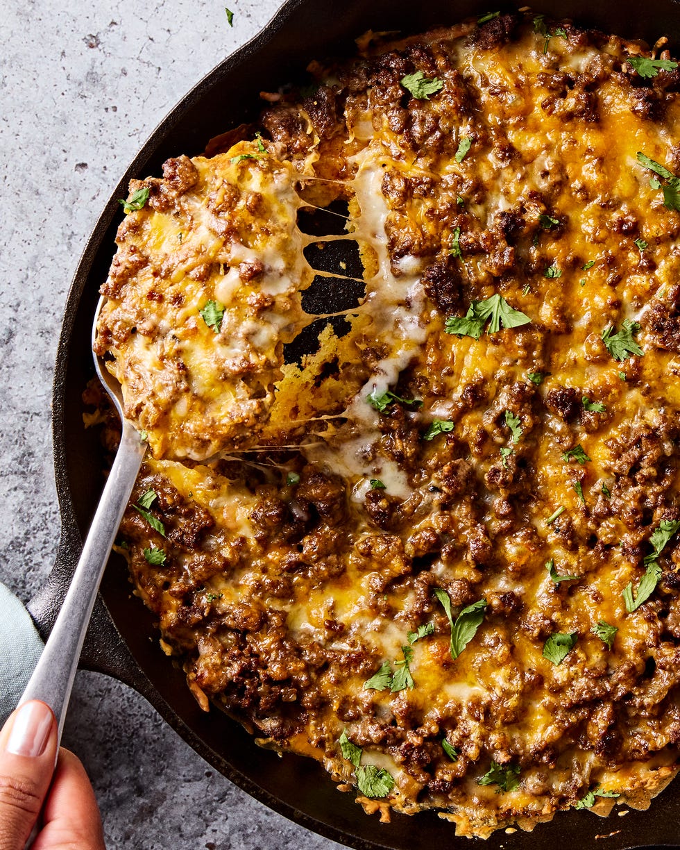 tamale pie with cheese and cilantro on top