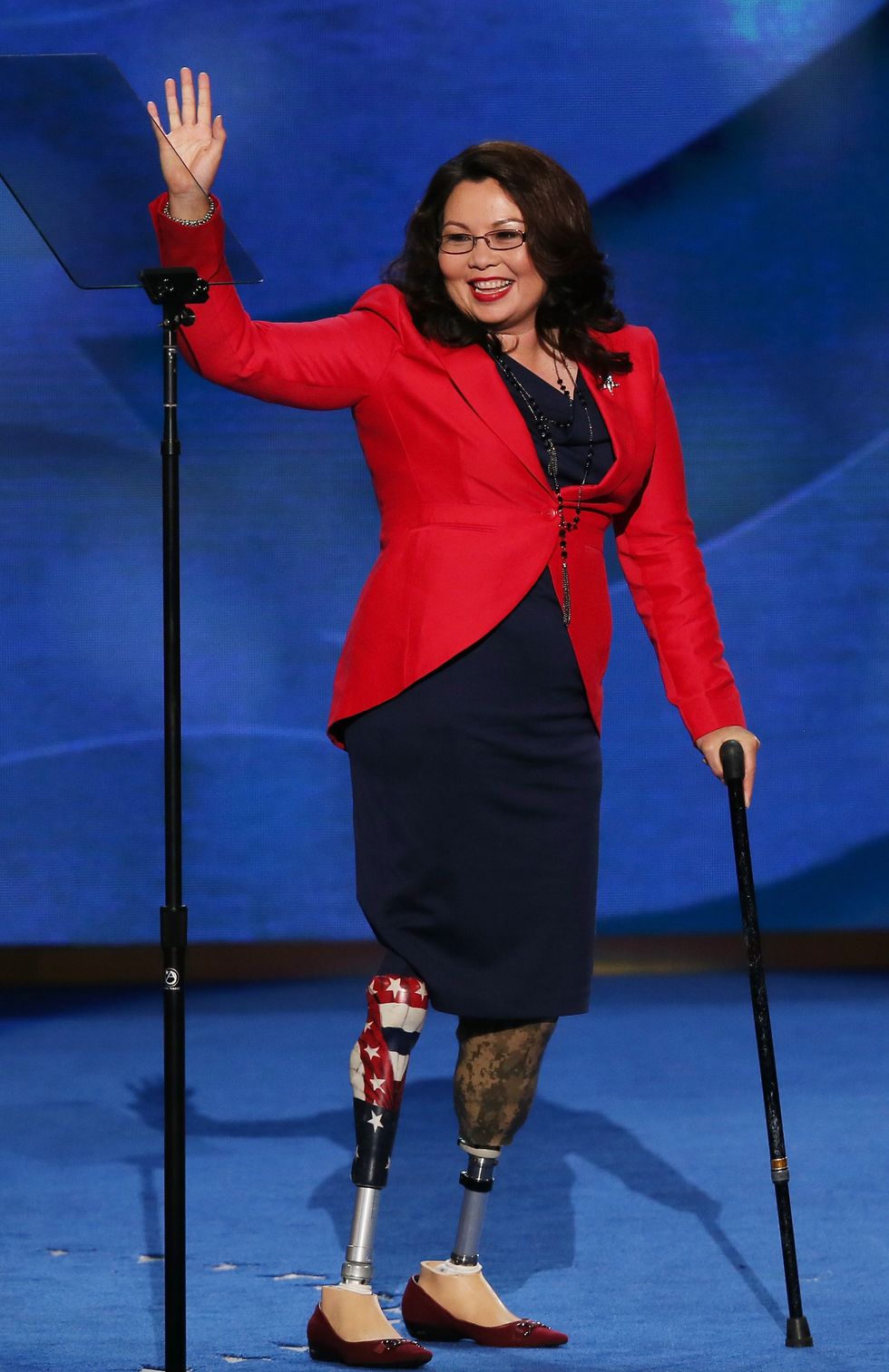tammy duckworth leaves the stage after speaking during day one of the democratic national convention