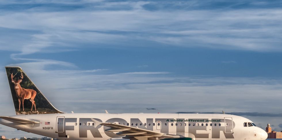 tampa international airport, florida december 7th, 2015 frontier airlines, airbus a319 111, n918fr "jake the white tailed deer" taxiing towards the runway for take off.