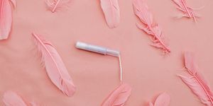 tampon and pin feathers.PINK COLOR