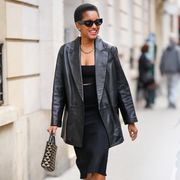 tamu mcpherson wears a black blazer to fashion week to illustrate a guide to the best black blazers of 2023
