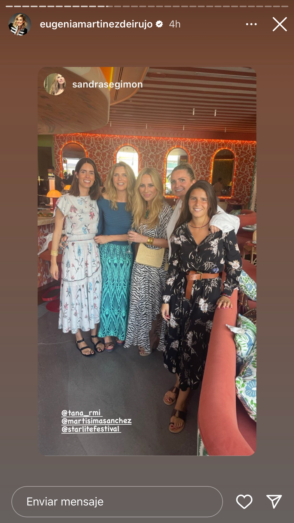 Tana Rivera in a printed midi dress tana rivera with printed midi dress