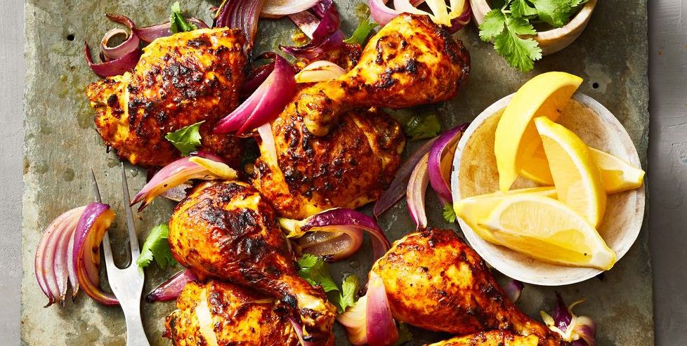tandoori chicken with lemons red onions and cilantro