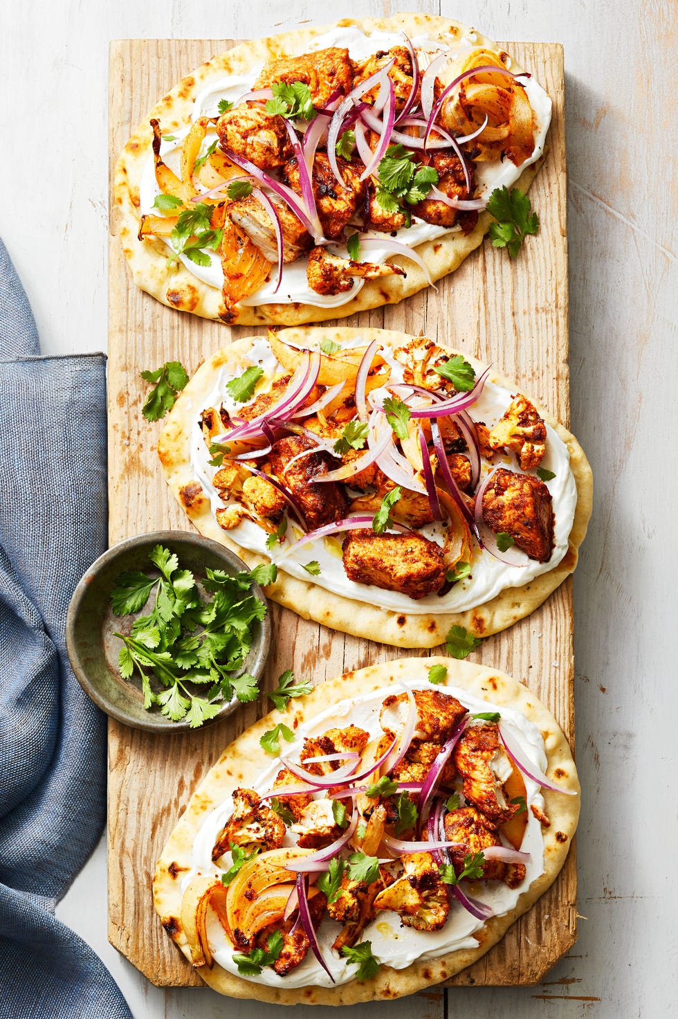 tandoori spiced cauliflower chicken on flatbreads