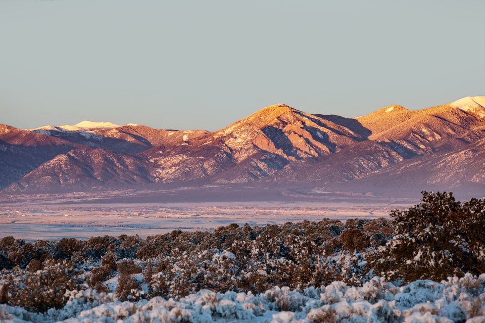 taos valley in winter sunset