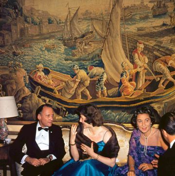 may 1959  robert david lion gardiner seated on the left, talking to guests in his fifth avenue house the tapestry is a gobelin from a design by joseph vernet  a wonderful time   slim aarons  photo by slim aaronsgetty images
