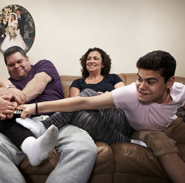 a group of people sitting on a couch