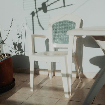 a white chair and a table