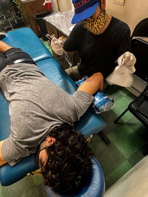 jason rogers at his tattoo appointment with tattoo artist andrew conte