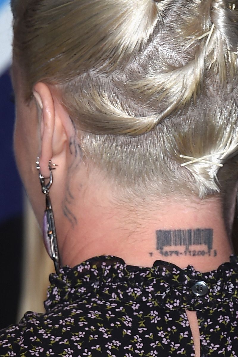 See Celebs' Wildest and Craziest Tattoos of All Time: From Grimes to  Machine Gun Kelly
