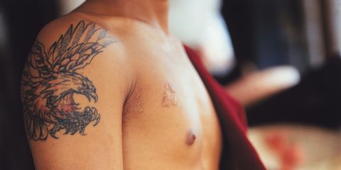 tattooed man in vietnam