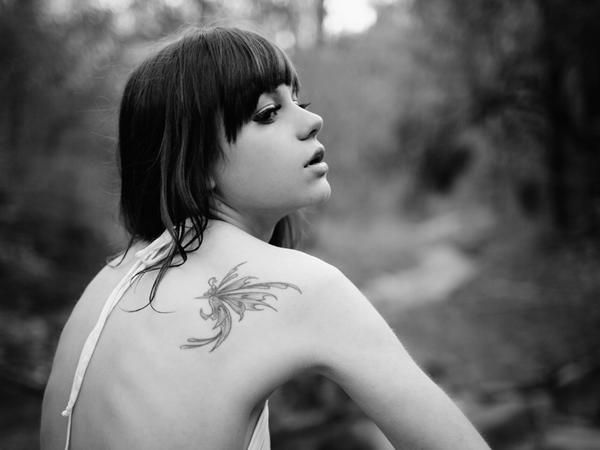 Lip, Skin, Shoulder, Joint, Tattoo, Style, Bangs, Monochrome photography, Beauty, Neck, 