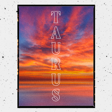 the word taurus in white letters over an image of a sunset