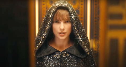 taylor wearing a cloak in her two videos