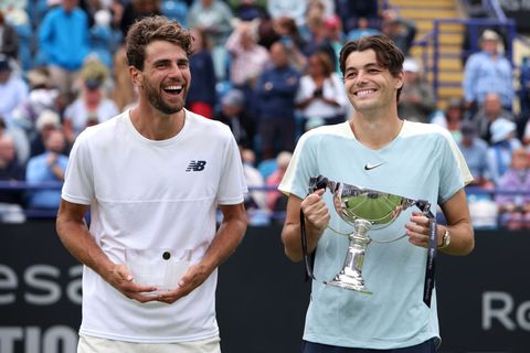 maxime cressy and taylor fritz pose with their trophies