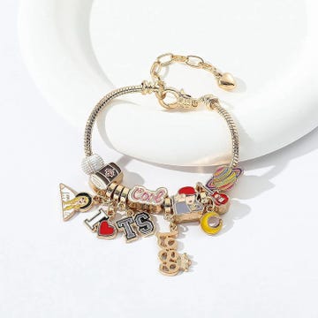 charm bracelet featuring various colorful and themed charms