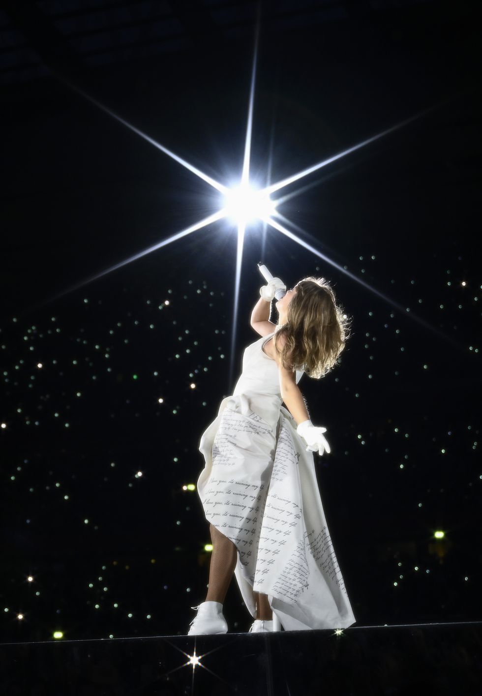 liverpool, england june 13 editorial use only no book covers editors note image has been created using a starburst filter taylor swift performs on stage during taylor swift  the eras tour at anfield on june 13, 2024 in liverpool, england photo by gareth cattermoletas24getty images for tas rights management
