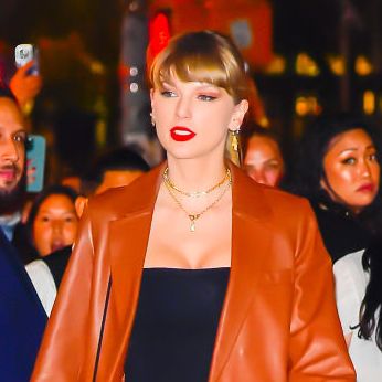 Taylor Swift Wears a Sexy Fall Look in Russet Miniskirt and Boots