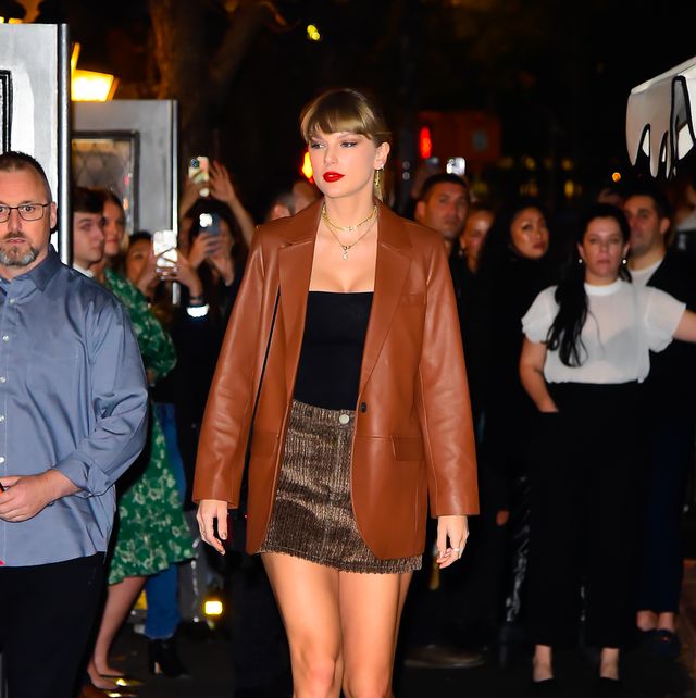 Taylor Swift Styled Black Boots And A Brown Coat In New York