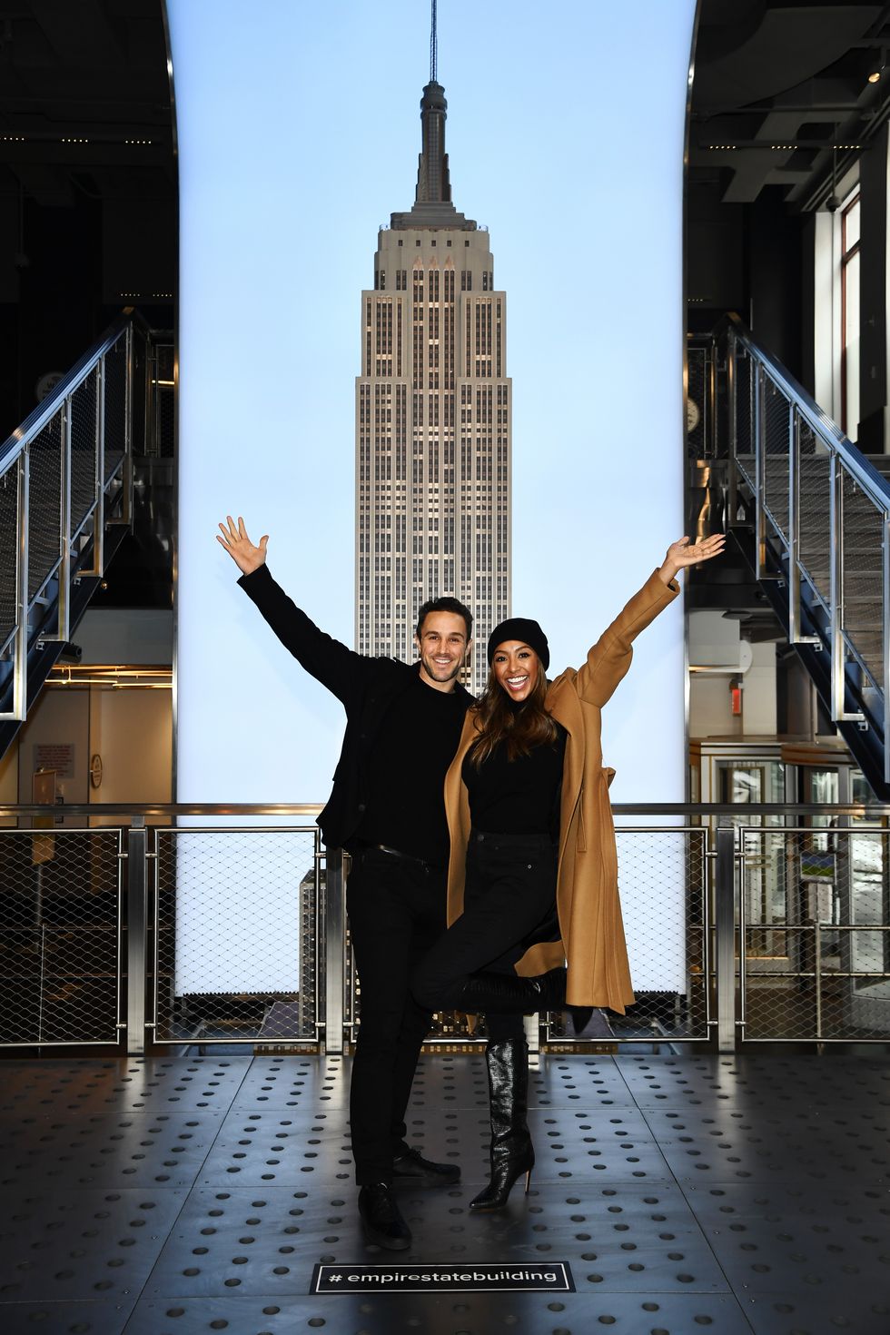 tayshia adams and zac clark celebrate their love at the empire state building