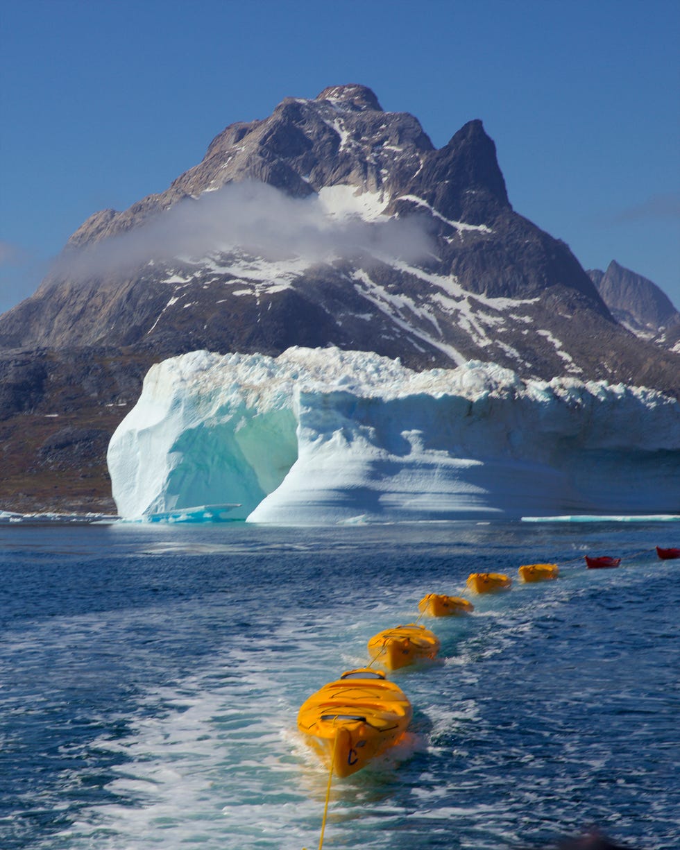 kayak excursion during luxury expedition ship seabourn venture's greenland cruise