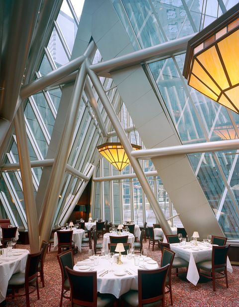 Restaurant, Yellow, Building, Ceiling, Room, Interior design, Architecture, Daylighting, Window, Table, 