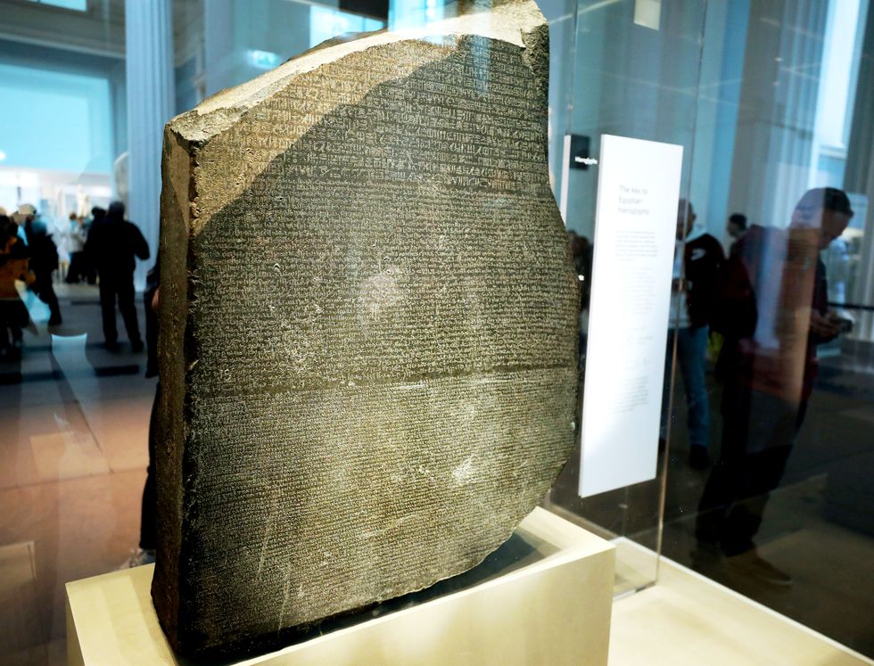 220512 london, may 12, 2022 xinhua photo taken on may 11, 2022 shows the rosetta stone in the british museum in london, britain the rosetta stone is one of the most famous objects in the british museum the stone is a broken part of a bigger stone slab it has a message carved into it, written in three types of writing it was an important clue that helped experts learn to read egyptian hieroglyphs a writing system that used pictures as signs xinhuali ying xinhua news agency eyevine contact eyevine for more information about using this image t 44 0 20 8709 8709 e infoeyevinecom httpwwweyevinecom