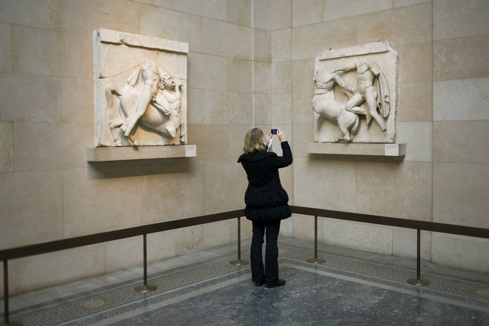 woman photographs photograps the ancient greek parthenon metopes also knows as the elgin marbles in the british museum 92 metopes were rectangular slabs placed over the columns of the athens parthenon temple depicting scenes from greek mythology the elgin marbles are a collection of classical greek marble sculptures mostly by phidias and his pupils, inscriptions and architectural members that originally were part of the parthenon and other buildings on the acropolis of athens thomas bruce, 7th earl of elgin, the british ambassador to the ottoman empire from 1799–1803, obtained a controversial permit from the ottoman authorities to remove pieces from the acropolis from 1801 to 1812 elgins agents removed about half of the surviving sculptures of the parthenon photo by in pictures ltdcorbis via getty images