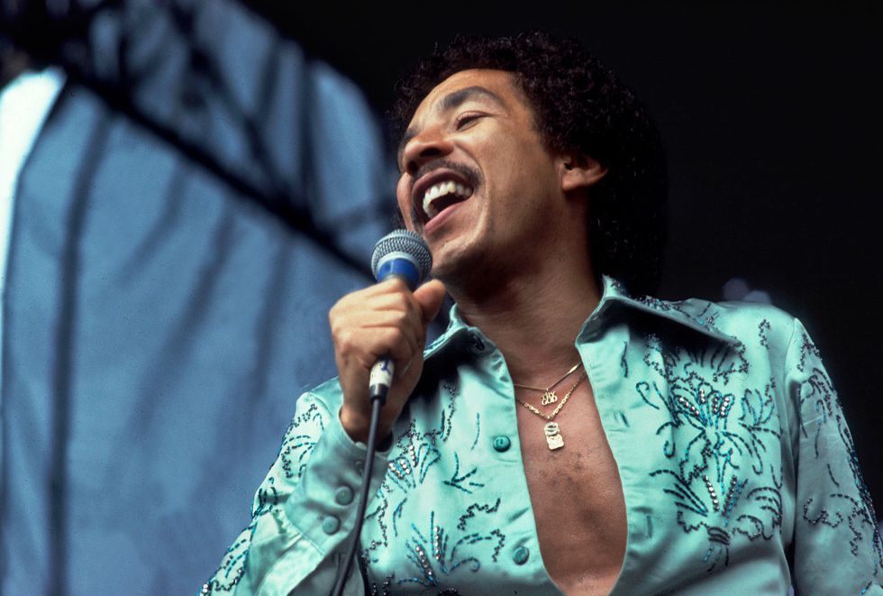 american singer smokey robinson performs onstage at soldier field, chicago, illinois, july 18, 1980 photo by paul natkingetty images