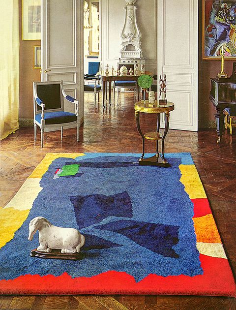 Blue, Carpet, Room, Floor, Living room, Flooring, Interior design, Rug, Furniture, Table, 