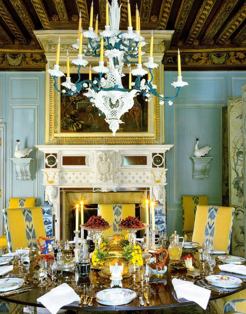 Room, Dining room, Furniture, Yellow, Interior design, Lighting, Chair, Chandelier, Table, Ceiling, 