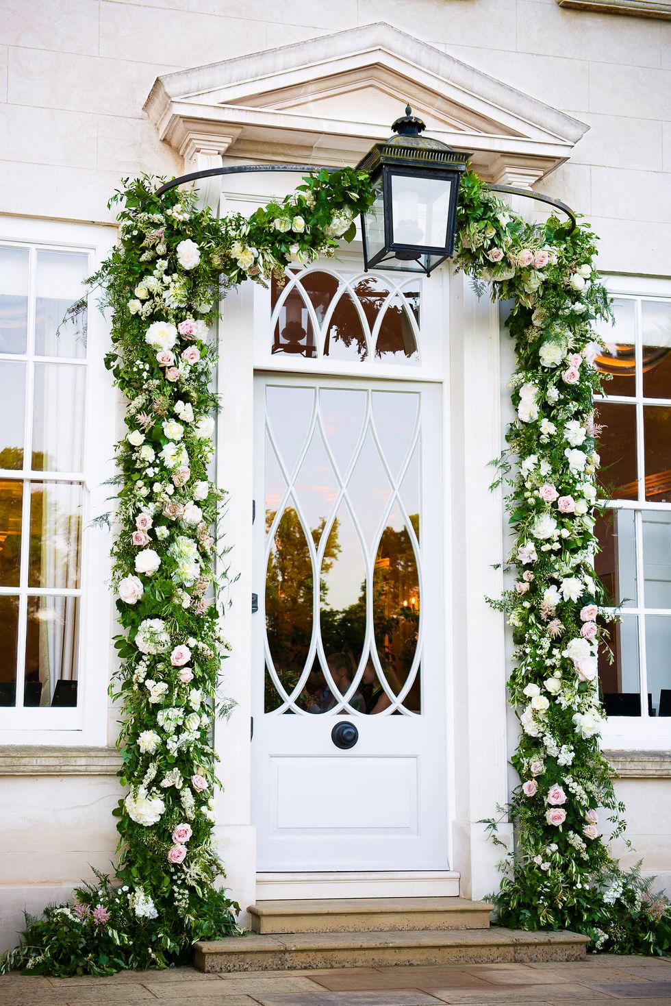 Door, Christmas decoration, House, Plant, Arch, Porch, Building, Architecture, Flower, Home, 
