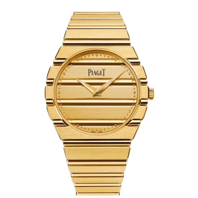 a gold watch with a white background