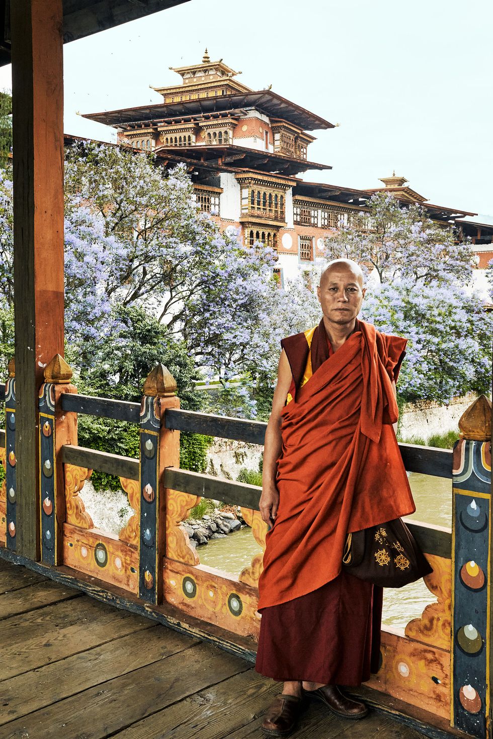 punakha dzong and buddhist monk in bhutan