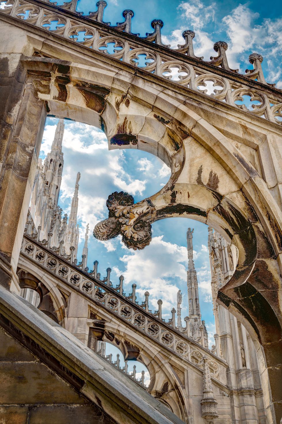 milan cathedral roof, italy luxury architecture detail of ornate gothic rooftop famous old milan cathedral duomo di milano is top tourist attraction of milan close up of luxury carved exterior shutterstock id 678687970 purchaseorder job client other